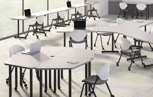 3D render of a well-lit classroom with larger, white tables and chairs